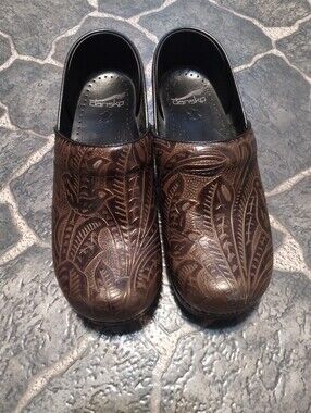 Dansko brown tooled leather floral professional clogs